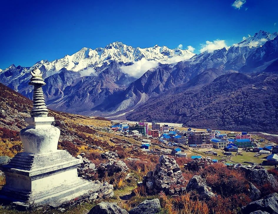 Kyanjin Gompa monastery surrounded by Himalayan peaks in Langtang Valley