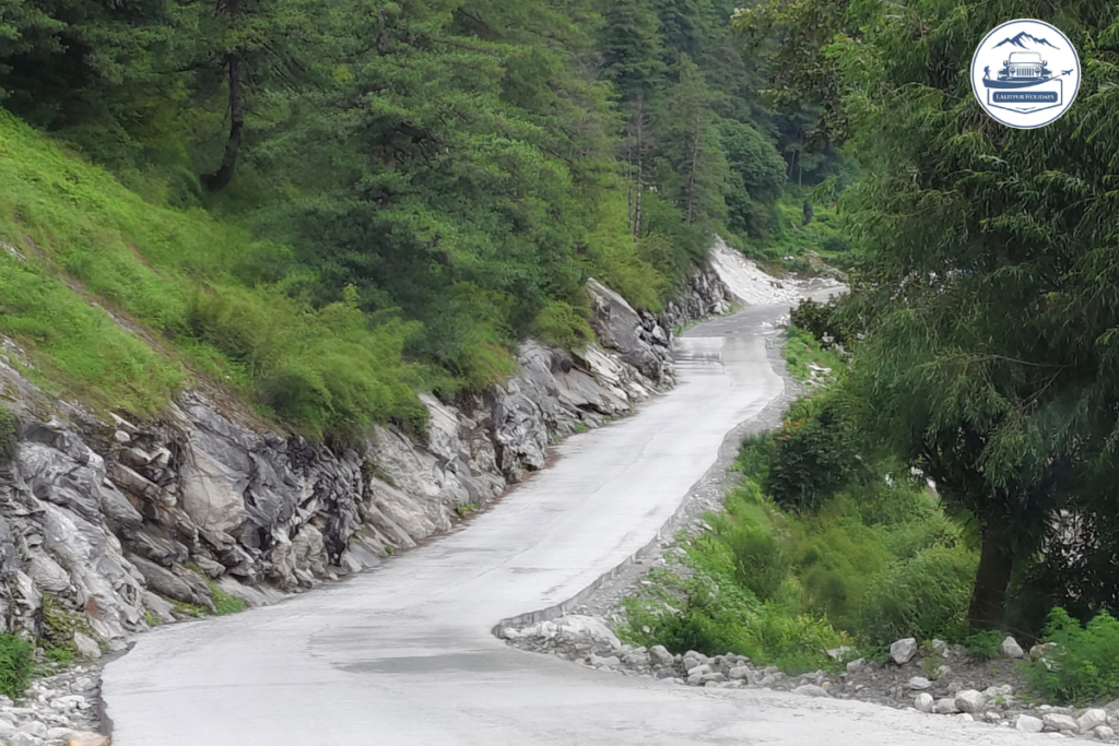 Mountain approach road to Upper Mustang through green hillside terrain