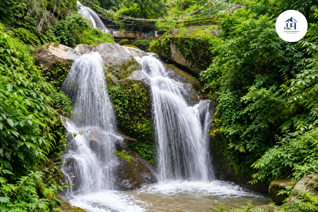 jhor waterfall near kathmandu with cascading water, forest greenery and walking access above the falls