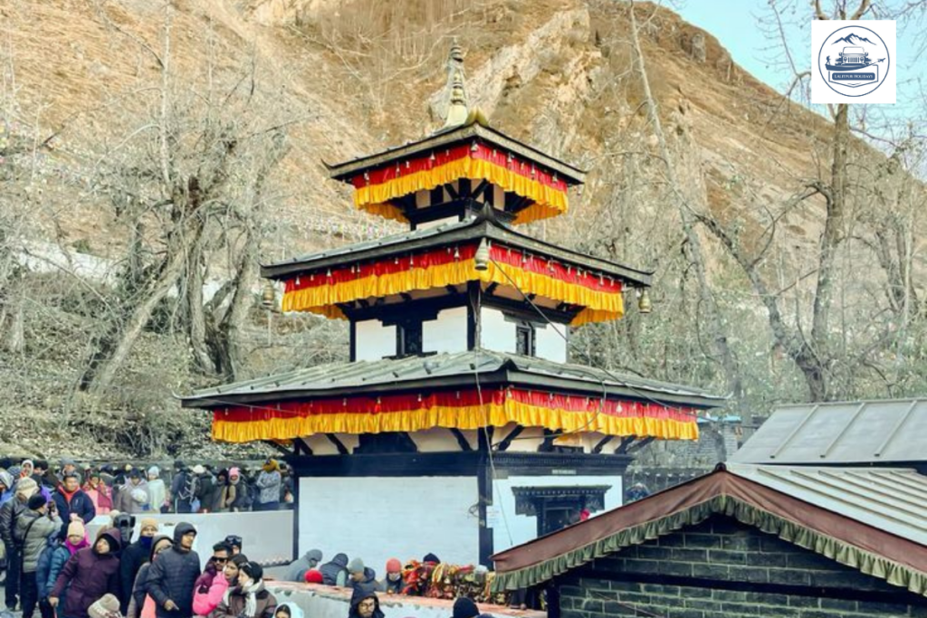 Muktinath Temple in Mustang, Nepal, with pilgrims visiting the temple complex.